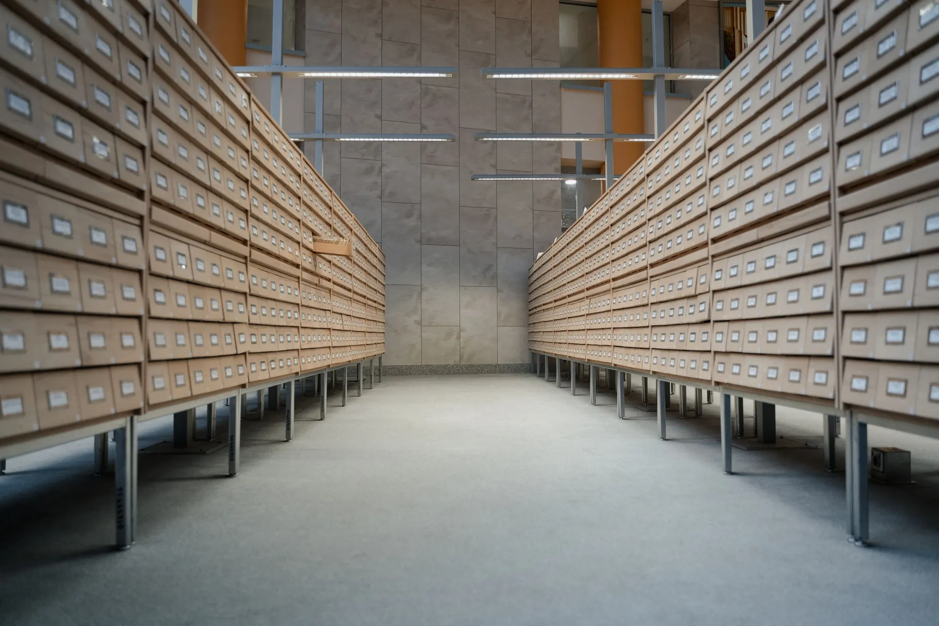 A long hall of card catalog drawers