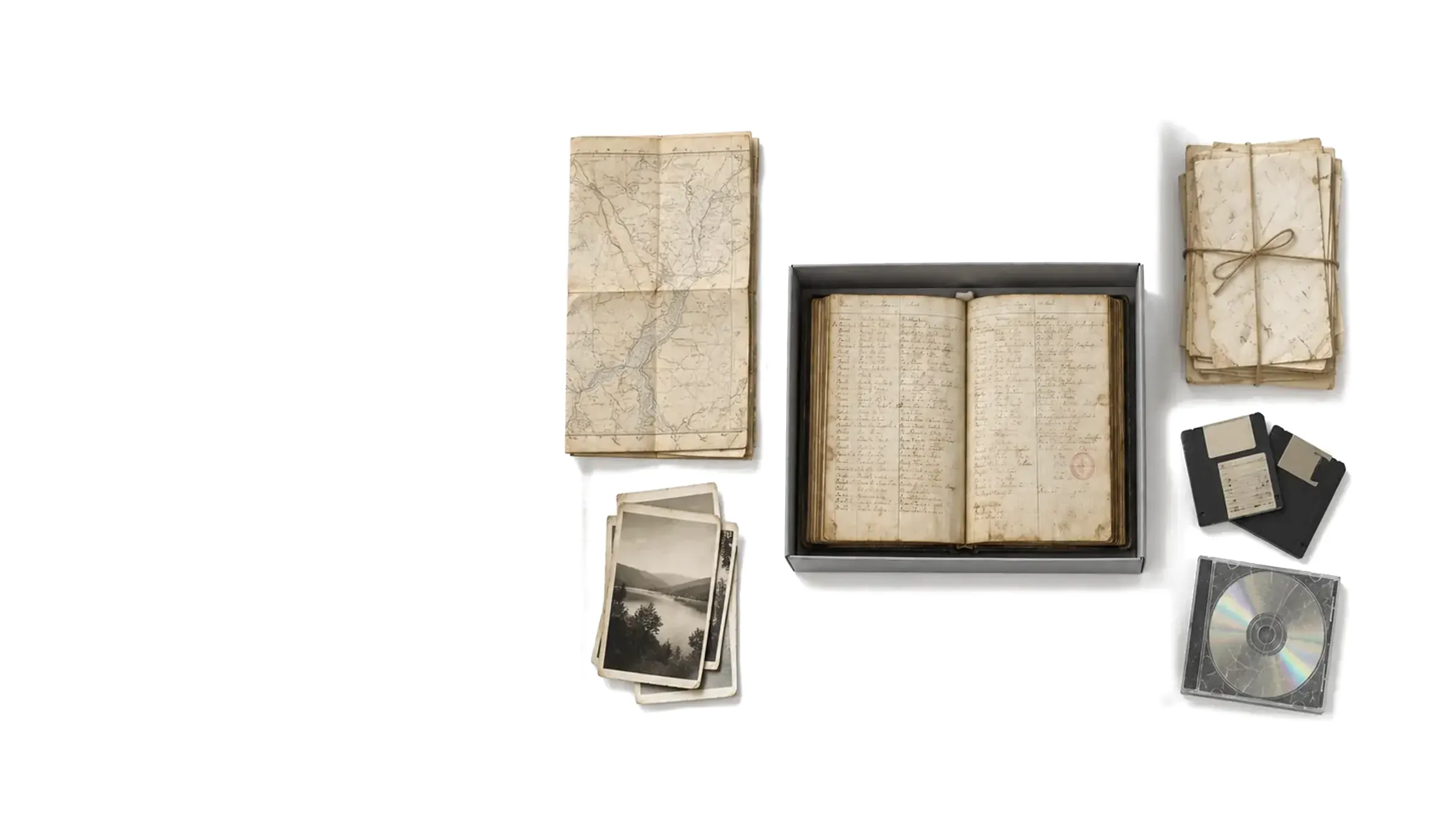 Generated image: an archive table seen from above: a folded map over old photographs, an open box holding an old handwritten ledger, and a bundle of letters over old discs
