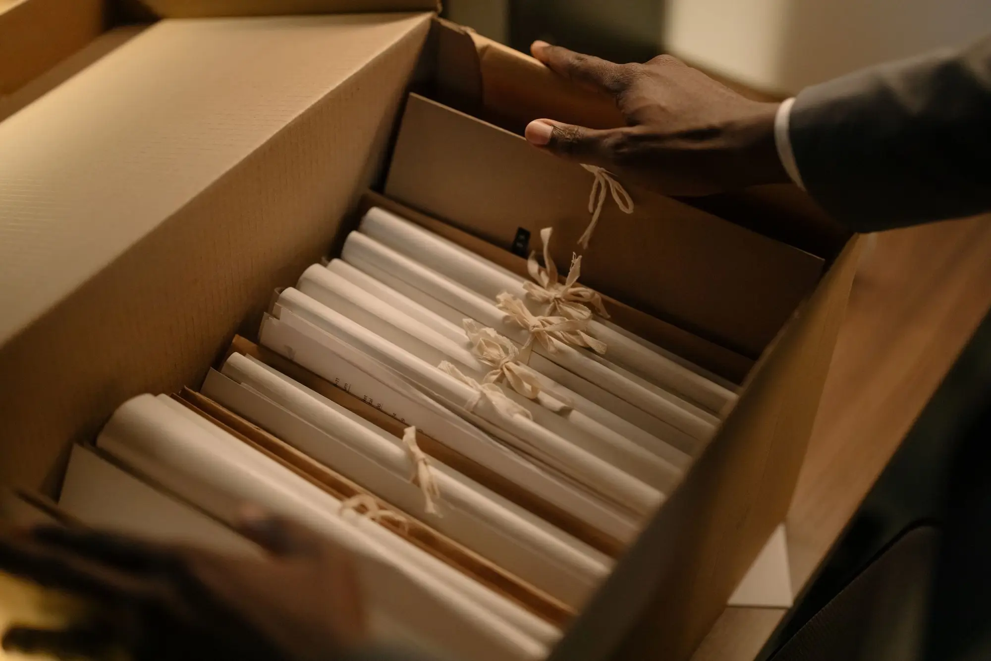 A box of case files tied with string